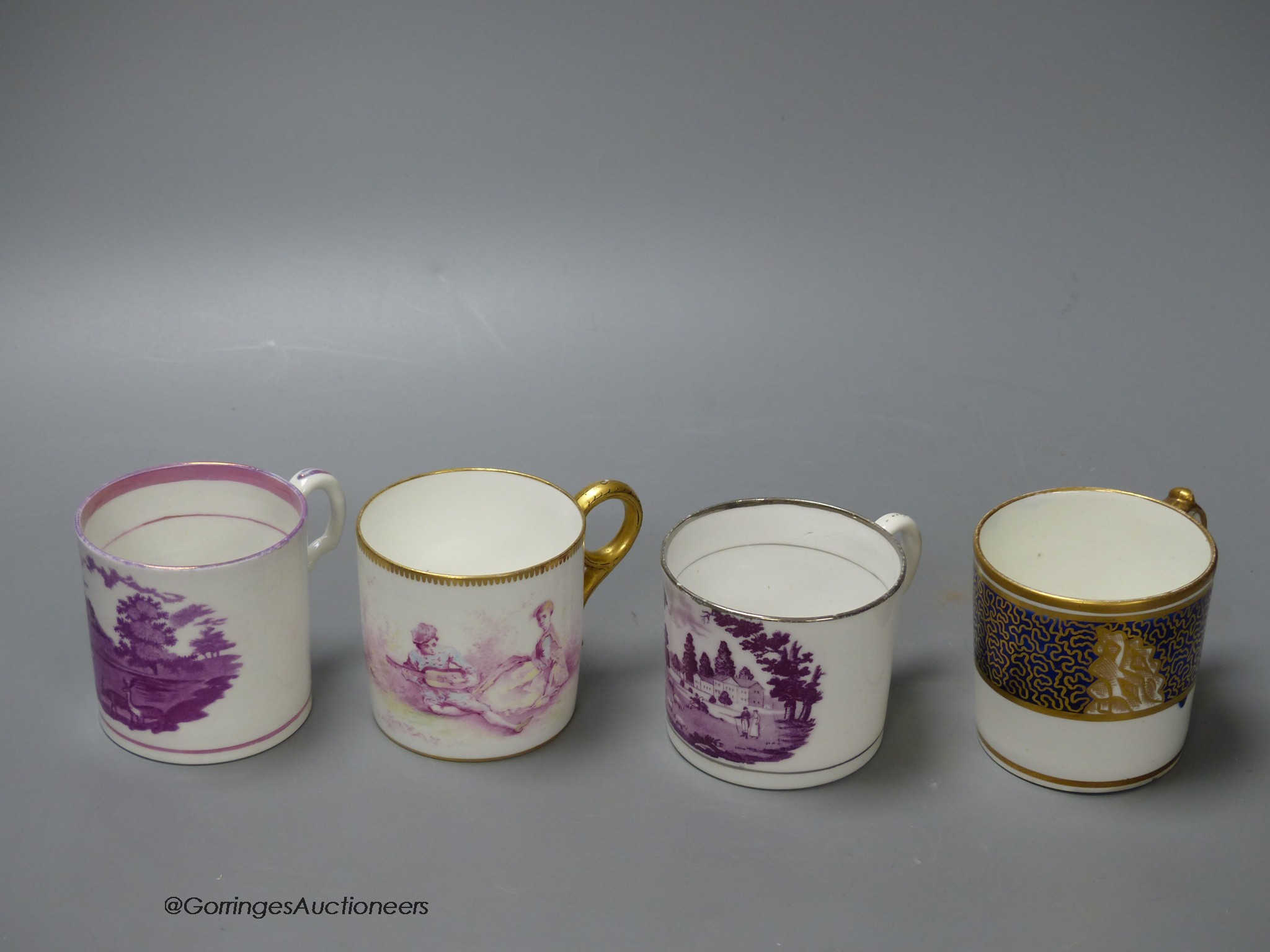 Four coffee cans Minton painted in Watteauseque style made for A.B.Daniell, another Minton with purple landscape, a Herculaneum with landscape, and a Miles Mason blue and gilt